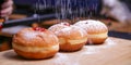 Hanukkah food doughnuts with jelly and sugar powder with bookeh background. Jewish holiday Hanukkah concept and background.