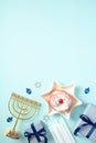 Hanukkah holiday vertical banner. Flat lay composition with menorah, gift box, candles, david star shaped plate with jelly donut Royalty Free Stock Photo