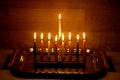 Hanukkah is a Jewish holiday. Burning Chanukah candlestick with candles. Chanukiah Menorah