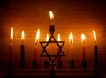 Hanukkah is a Jewish holiday. Burning Chanukah candlestick with candles. Chanukiah Menorah