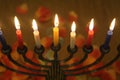 Hanukkah Jewish holiday theme with candles light in the menorah Royalty Free Stock Photo