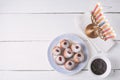 Hanukkah menorah and sufganiot on the white wooden table top view Royalty Free Stock Photo