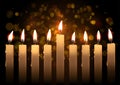 Hanukkah realistic vector candles over bokeh background. Created with gradient mesh