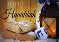 Hanukkah still life image of rustic lantern decorated with blue and silver ribbons. Royalty Free Stock Photo