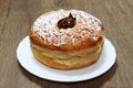 Hanukkah Sufganiyah - Jewish Donut for Jewish holiday Hanukkah. Sufganiyah - symbol of Hanukkah. Hebrew name - Sufganiot