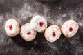 Hanukkah sufganiyot on black slate