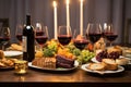 hanukkah table set with kosher food and wine