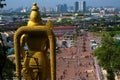 Hanuman Hindu god statue staring at Kuala Lumpur skyline