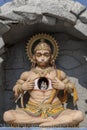 Hanuman statue, Hindu idol near Ganges River, Rishikesh, India. Sacred places for pilgrims Royalty Free Stock Photo