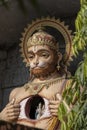 Hanuman statue, Hindu idol near Ganges River, Rishikesh, India. Sacred places for pilgrims Royalty Free Stock Photo