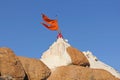 Hanuman temple and a red flag fluttering. Hampi, Karnataka, India Royalty Free Stock Photo