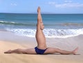Hanumanasana pose yoga man beach