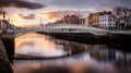 Hapenny Bridge over the Liffey River long exposure at sunset