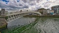 HaPenny bridge on the river Liffey Dublin city center Ireland