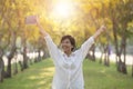 Hapiness face of yonger woman and student book in hand standing