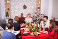 Happines around the table at christmas family celebration