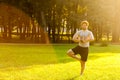 Happines bearded athlete doing yoga.