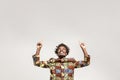 Happiness african man pointing finger up at copy space Royalty Free Stock Photo