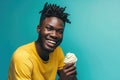 Happiness African Yearold Man Eats Vanilla Ice Cream On Turquoise Background Royalty Free Stock Photo