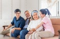 Happiness Asian family concept, Senior mother father and middle aged son and daughter in living room Royalty Free Stock Photo