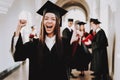 Happiness. Asian Girl. Graduate. Standing. Cap.