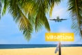 Vacation written on yellow sign and commercial plane flying on blue sky with coconut palm leaves and tropical beach background Royalty Free Stock Photo