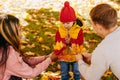 The happiness of being parents and having a child. Outdoor games for good a good health.