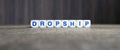 Dropship boggle word cubes on dark background