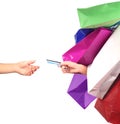 Happiness, consumerism, sale and people concept. Woman with shopping bags and debit card.