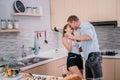 Happiness couple enjoy their time at the kitchen when prepare cooking