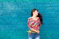 Happiness and craziness. Smiling funny girl have fun outdoor and dances. Young attractive woman with waving long hair Royalty Free Stock Photo