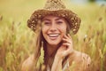 Happiness is a day in nature. a young woman in a wheat field. Royalty Free Stock Photo