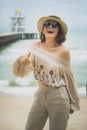 Happiness emotion of young woman standing at vacation sea side Royalty Free Stock Photo