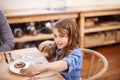 Happiness is a flapjack breakfast. a little girl enjoying breakfast with her family. Royalty Free Stock Photo