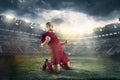 Happiness football player after goal on the field of stadium Royalty Free Stock Photo