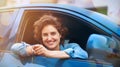 Happiness is, getting your very first car. a happy young woman holding the keys to a new car. Royalty Free Stock Photo