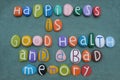 Happiness is good health and a bad memory, lifestyle quote composed with multi colored stone letters Royalty Free Stock Photo