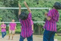 Happiness group of teenage friends playing volleyball Royalty Free Stock Photo