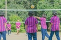 Happiness group of teenage friends playing volleyball