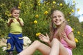 Happiness of life.A beautiful girl plays and has fun with a baby boy Royalty Free Stock Photo