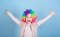 Happiness is living life from the inside out. Happy little girl child wearing bright wig hair smiling with happiness Royalty Free Stock Photo