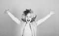 Happiness is living life from the inside out. Happy little girl child wearing bright wig hair smiling with happiness Royalty Free Stock Photo