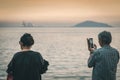 Happiness Mature couple take a photo of sunset