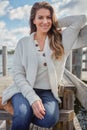 Happiness is a mood, positivity is a mindset. Portrait of a beautiful young woman relaxing outdoors. Royalty Free Stock Photo