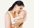 Happiness mother, sweet sleeping baby in a mother's embrace Royalty Free Stock Photo