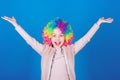 Happiness only real when shared. Happy little girl child wearing bright wig hair smiling with happiness. The child of so Royalty Free Stock Photo