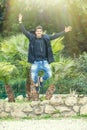 Happiness success of a young man outdoors. Jumping for joy Royalty Free Stock Photo