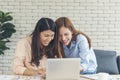 Happiness two women working together confident team meeting in office desk. Team business partners working with computer laptop Royalty Free Stock Photo