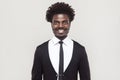 Happiness well dressed afro businessman looking at camera, tooth