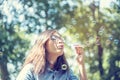 Happiness woman blowing soap joyful outdoors green park. Asian young women joy blow bubble leisure freedom lifestyle. Gorgeous Royalty Free Stock Photo